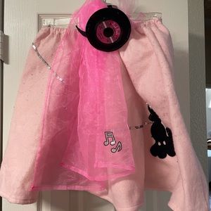 Poodle skirt, headband, and scarf